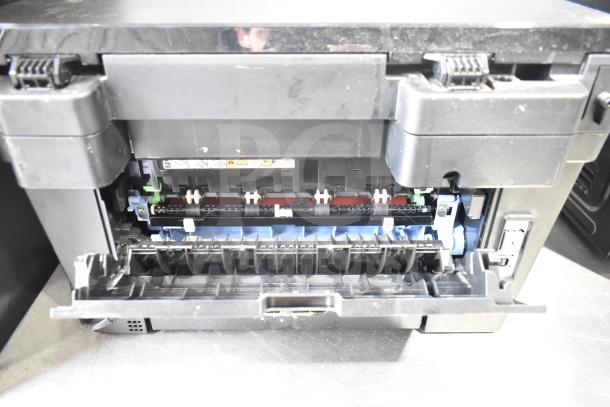 Brother HL-L2380DW multifunction printer interior view, showing paper feed mechanism; in used condition.
