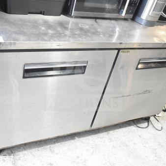 Yukon YUC-60F commercial 2-door undercounter freezer, 115 volts, 1 phase, stainless steel, visible wear, Yukon label.