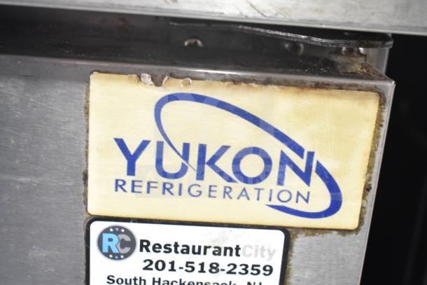 Yukon YUC-60F Commercial Undercounter Freezer, 2 doors, 115 volts, 1 phase, Yukon Refrigeration logo visible.