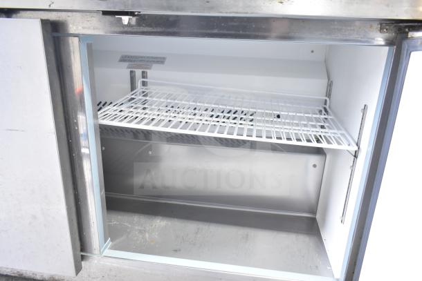 Yukon YUC-60F commercial 2-door undercounter freezer, 115V, 1-ph, featuring wire shelves and clean interior.