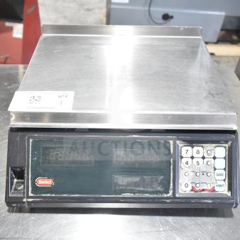 Berkel countertop food portioning scale, stainless steel, digital display, keypad, 115 volts, 1 phase, used condition.