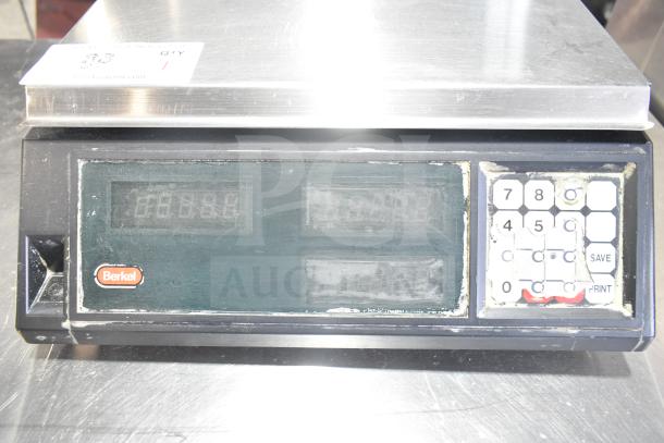 Berkel countertop food portioning scale, 115 volts, 1 phase, digital display, keypad, used condition.