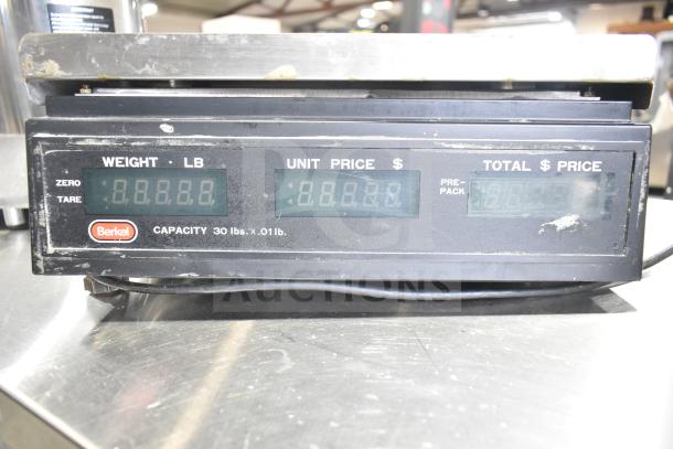 Berkel countertop food portioning scale, 115 volts, 1 phase, capacity 30 lbs x 0.01 lb, digital display, used condition.