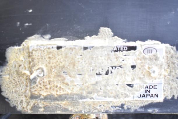 Berkel countertop food portioning scale, used condition, 115 volts, 1 phase. Label indicates "Made in Japan."