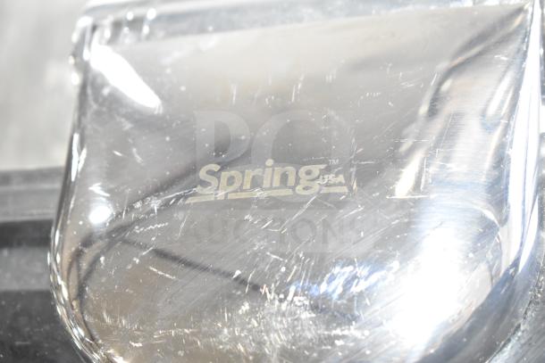 Stainless steel Spring USA bin, polished finish with visible logo. Good condition, minor surface scratches.