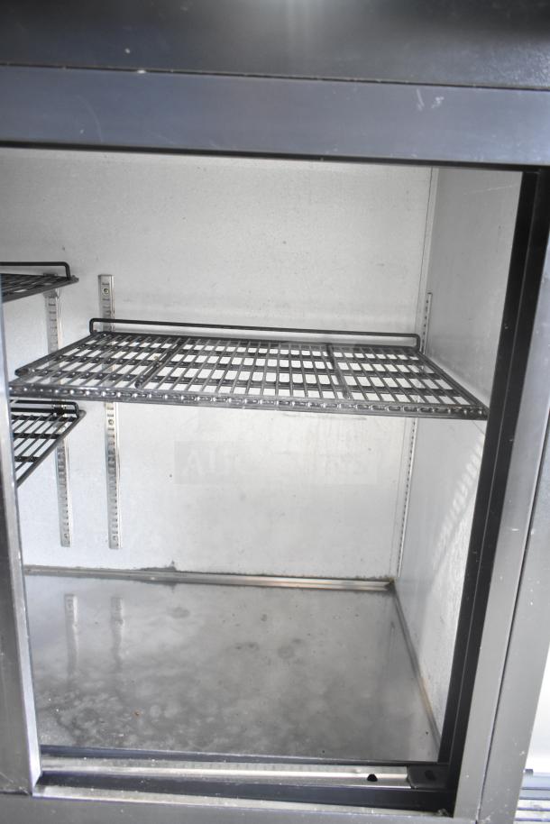 Everest EBB59G-SD commercial 2-door back bar cooler, 115 volts, 1 phase, metal shelves, indoor lighting.