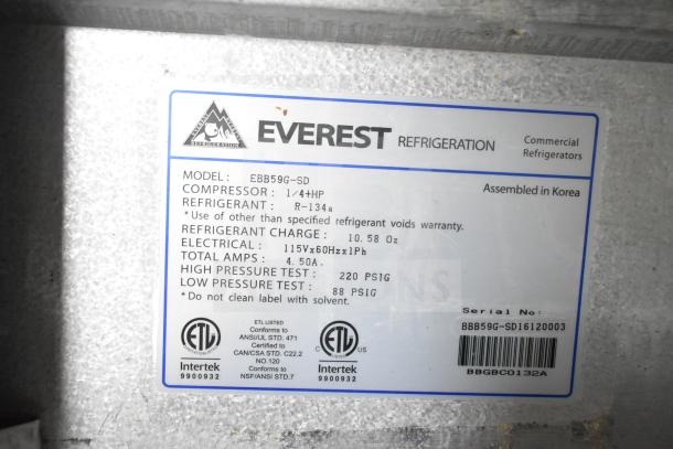 Label on Everest EBB59G-SD Cooler displaying model, refrigerant type, electrical specs, and conformity certifications.