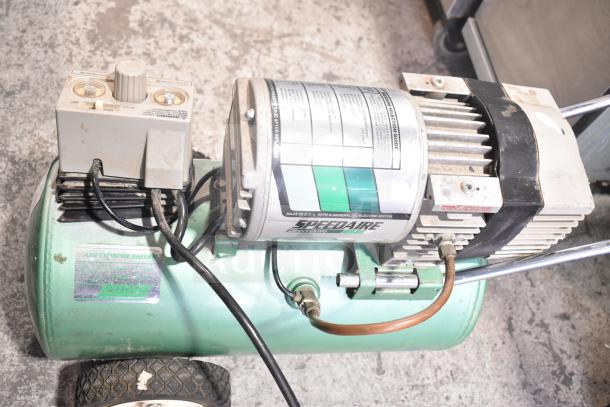Speedaire 5Z032A Direct Drive Air Compressor with electric motor. Visible labels indicate specifications. Good condition.