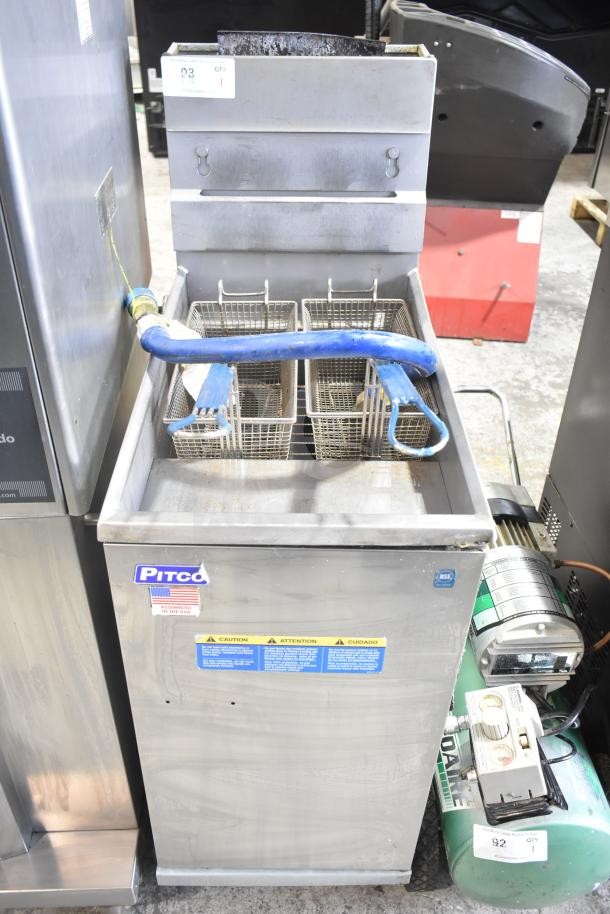 Pitco Frialator 35C commercial fryer, natural gas, 90,000 BTU. Features dual baskets and stainless steel body. Used condition.