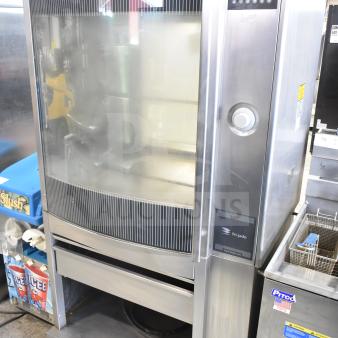 Fri-jado STG 7-P Commercial Electric Rotisserie Oven on casters, 208V, 3-phase. Stainless steel, control panel visible.