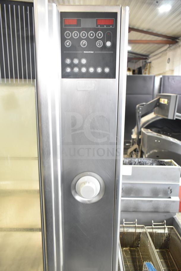 Fri-jado STG 7-P commercial electric rotisserie oven with control panel, stainless steel finish, on commercial casters.