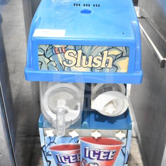 SPN IC2.1M commercial slushie machine, missing 1 hopper, 115V, 1 phase, blue exterior, "Icee" branding visible.