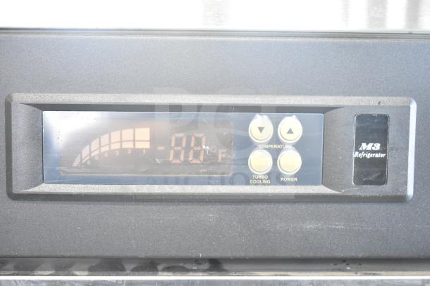 Turbo Air M3R47-2-N cooler display panel, showing temperature controls and power indicators.