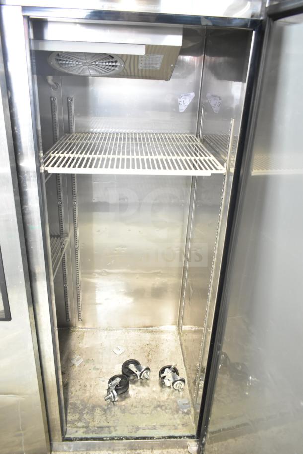 Turbo Air M3R47-2-N Commercial 2 Door Reach In Cooler, stainless interior, wire shelving, includes caster wheels.