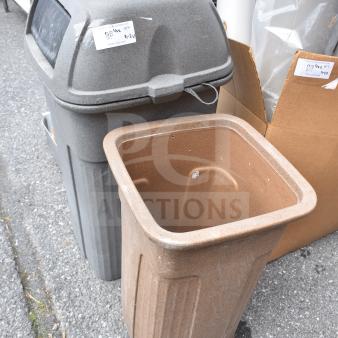 Two poly trash cans, one gray with a lid, one brown without; both show signs of wear. Labels indicate auction details.