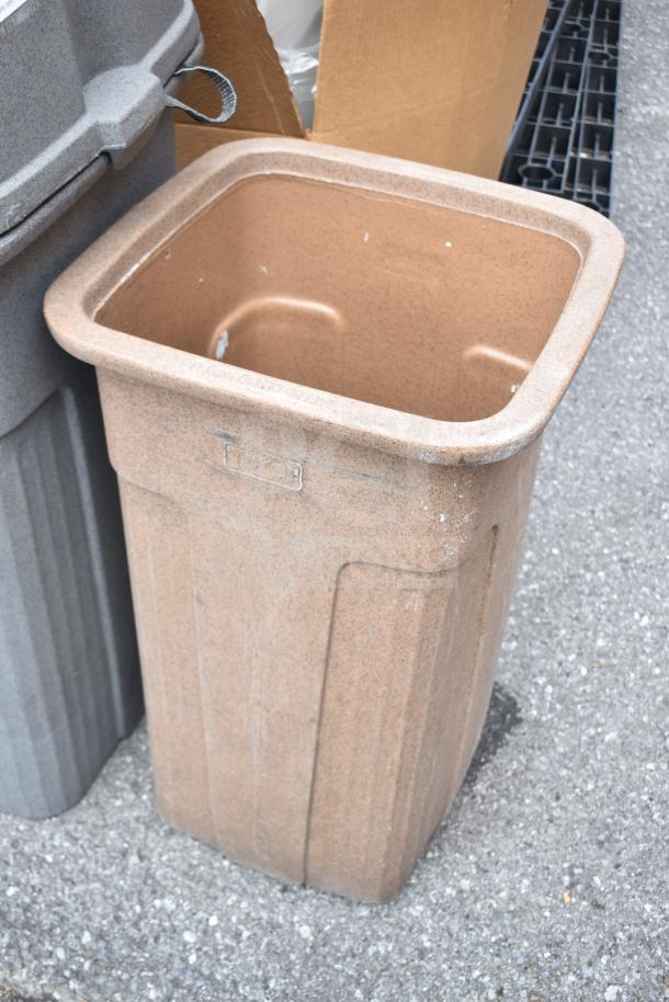 Two poly trash cans, durable plastic, gray and brown, lightly used condition, perfect for outdoor use, auction doubles your bid.