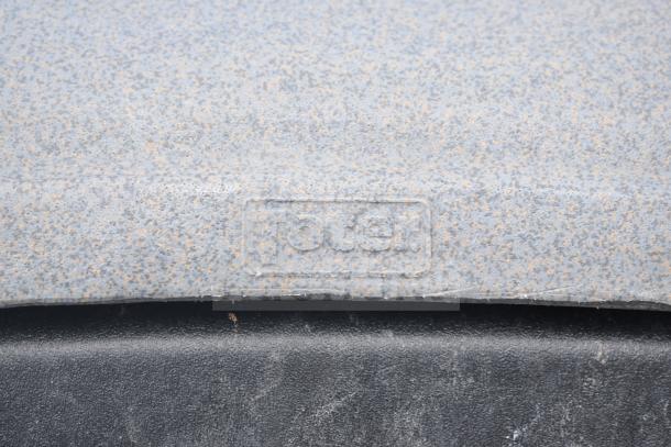 Two Poly trash cans with Toter logo, used condition visible on textured lids. Auction offers double quantity for bids.