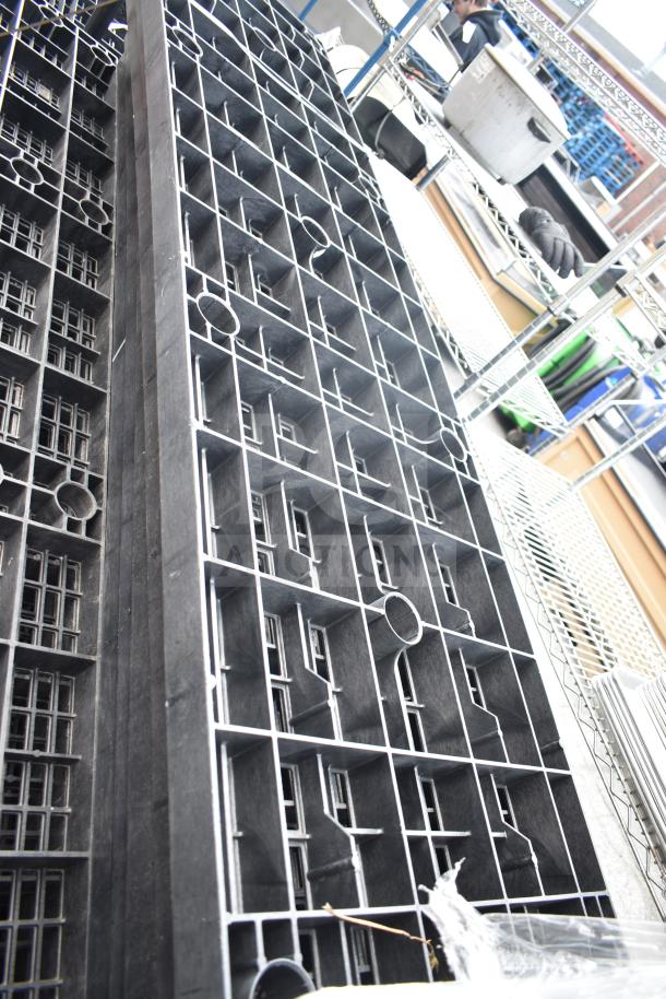 Lot of 23 black poly shelf pieces, each with grid design. New condition, suitable for storage or display.