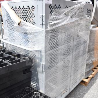Gray cabinet on commercial casters, metal lattice design, shrink-wrapped, excellent condition, label states '102 42x32 QTY'.
