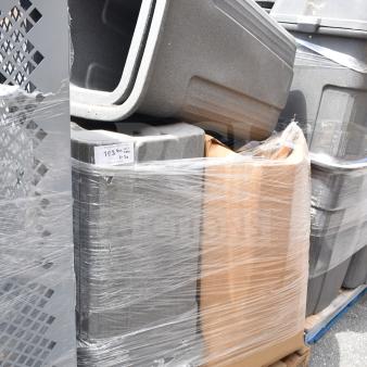 Set of 8 large gray plastic trash cans, stacked and shrink-wrapped, on a pallet. Ideal for bulk purchase.
