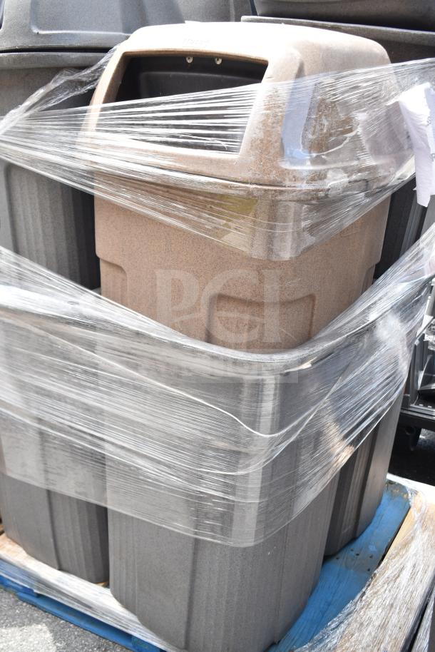 Eight various trash cans wrapped in plastic, stacked on a blue pallet. Durable, outdoor-use design. Suitable for commercial settings.
