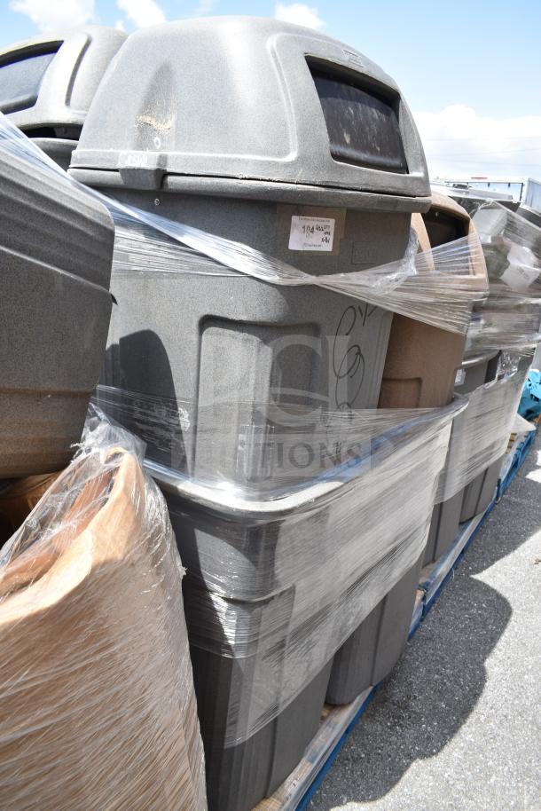 Pallet of 8 large plastic trash cans, used, wrapped for auction. Features dome lids. Label indicates lot number.