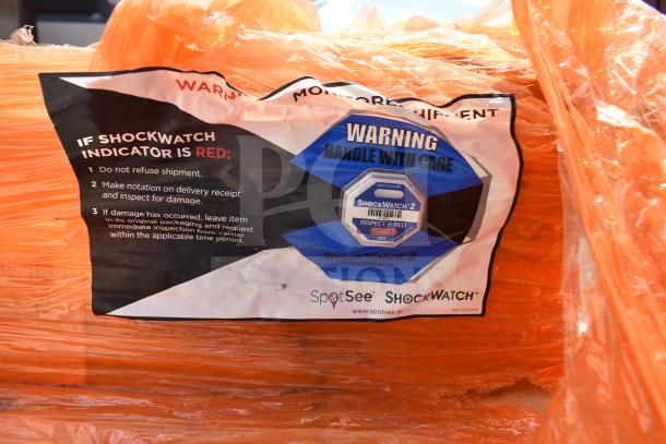 ALL ONE MONEY! pallet lot, featuring various items including Shock Watch 2. Visible label instructs handling if indicator is red.