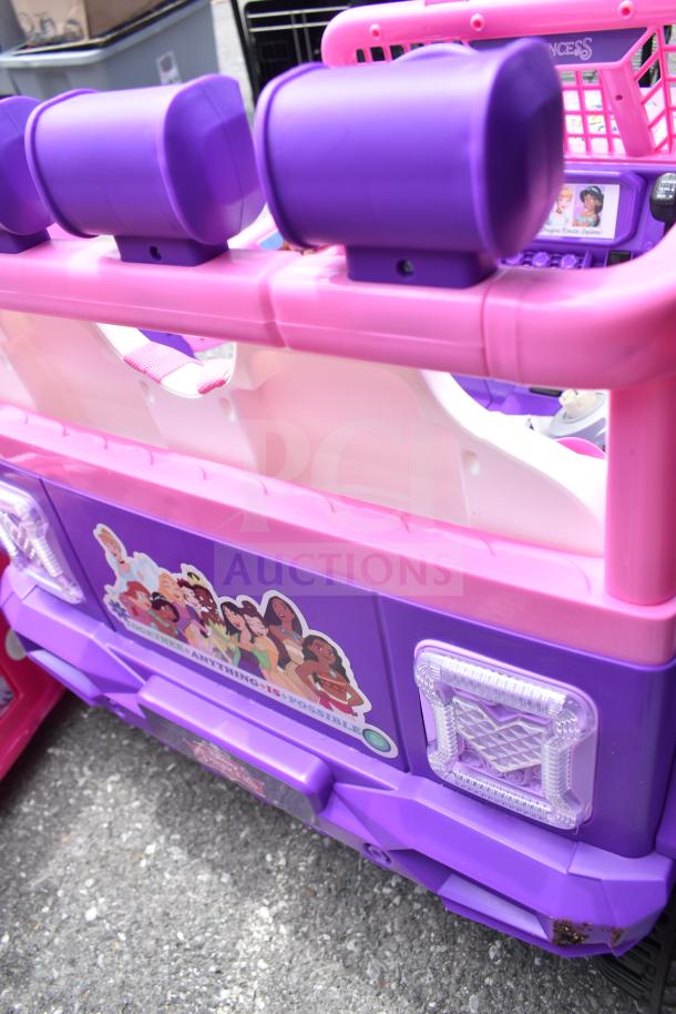 Disney Princess and Minnie Mouse children’s cars, purple and pink, stickers display characters. Minor wear visible.
