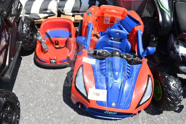 Two children's ride-on vehicles: a Spiderman-themed car and a red hover car. Both in good condition with visible price tag of $158.