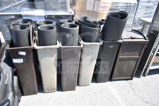 Six Slim Jim trash cans with rolled mats inside, various colors, outdoor setting, some wear visible, displayed for auction.