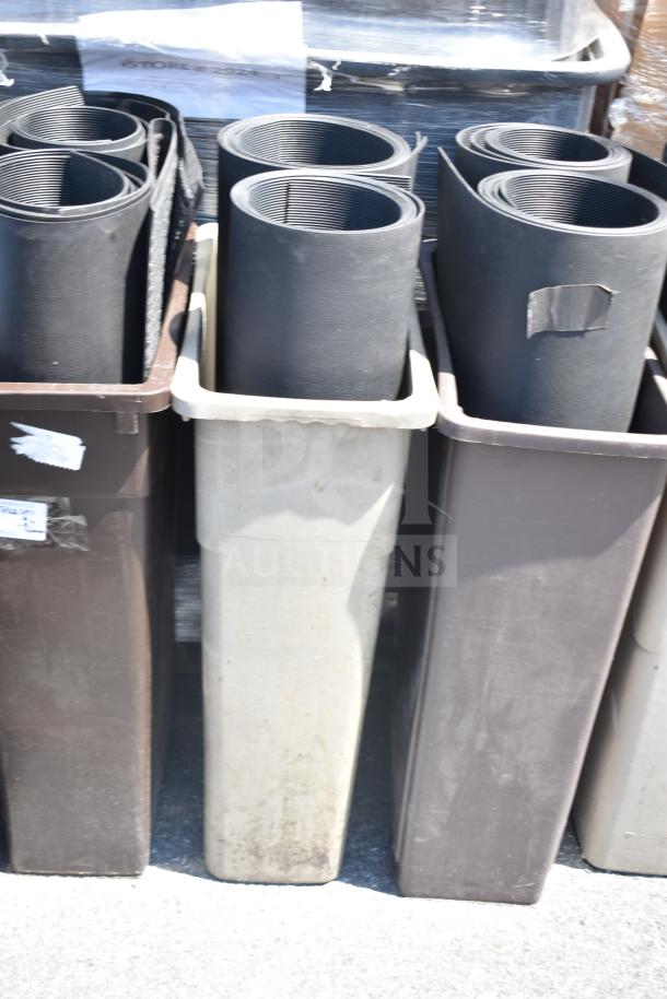 Six Slim Jim trash cans filled with rolled black mats, assorted colors, some wear visible, auction lot.