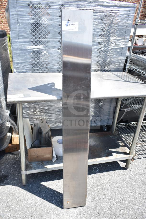 Stainless steel wall mount shelf, in good condition, features pre-drilled installation holes.
