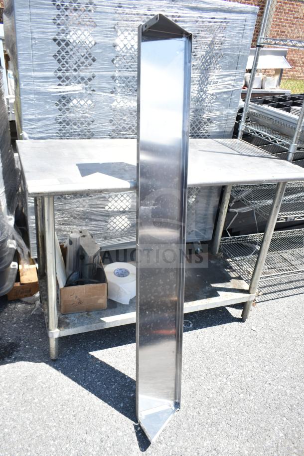 Tall metal wall mount shelf with triangular base, in good condition. Suitable for industrial or garage use.