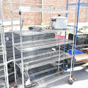 Chrome finish 5-tier wire shelving unit on commercial casters, used condition. Buyer must dismantle. Consider freight charges.