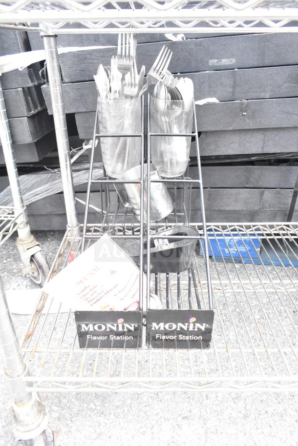Chrome finish 5-tier wire shelving unit on commercial casters, includes utensils and Monin flavor station. Buyer must dismantle.