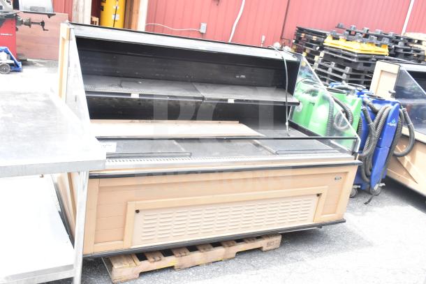 Killion Commercial Grab N Go Merchandiser, floor style, wooden paneling, glass display, pre-owned, located outdoors.