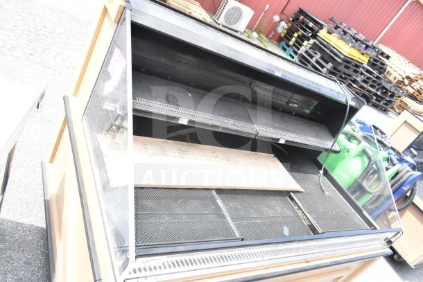 Killion Commercial Floor Style Grab N Go Merchandiser. Two-shelf design, open front, evident wear. Suitable for retail display.