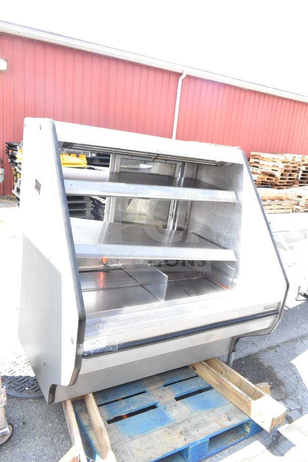 Custom's Deli Equipment commercial merchandiser display case, metal shelves, in used condition, ideal for delis.