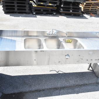 Krowne 18-63C commercial 3 bay back bar sink with dual drain boards, stainless steel, moderate wear, with faucet.