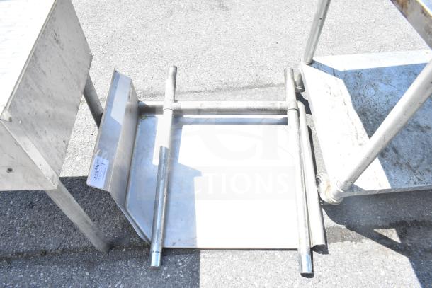 Commercial right-side clean side dishwasher table, stainless steel, sturdy frame, minor wear, suitable for professional kitchens.