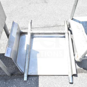 Commercial right-side clean side dishwasher table, stainless steel, sturdy frame, minor wear, suitable for professional kitchens.