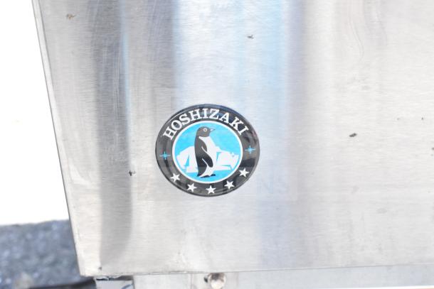 Hoshizaki Commercial Ice Machine with logo, stainless steel finish, suitable for high-capacity ice production.