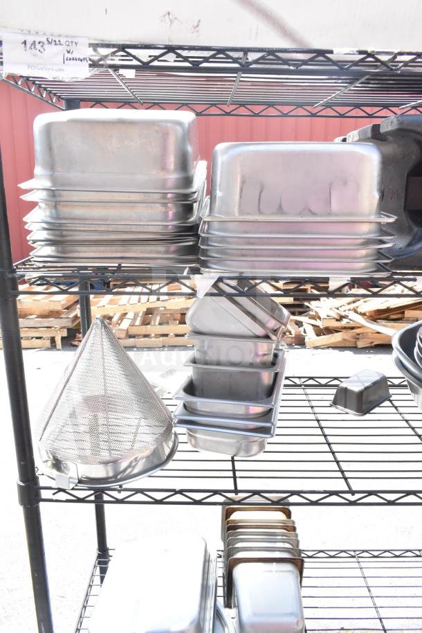 Black finish 5-tier wire shelving unit with assorted metal trays and containers. Buyer must dismantle for shipping.