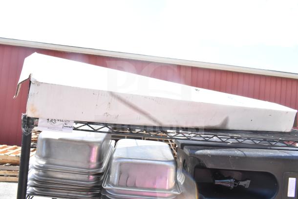 Black finish 5-tier wire shelving unit with various contents. Note: Buyer must dismantle for shipping.