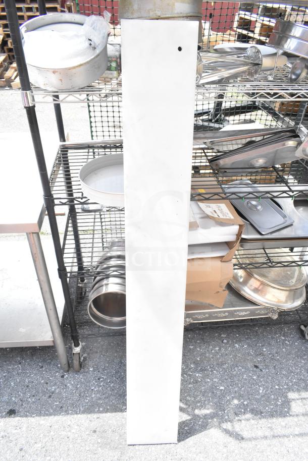 Chrome and black 6-tier wire shelving unit with assorted contents. Unit must be dismantled by buyer.