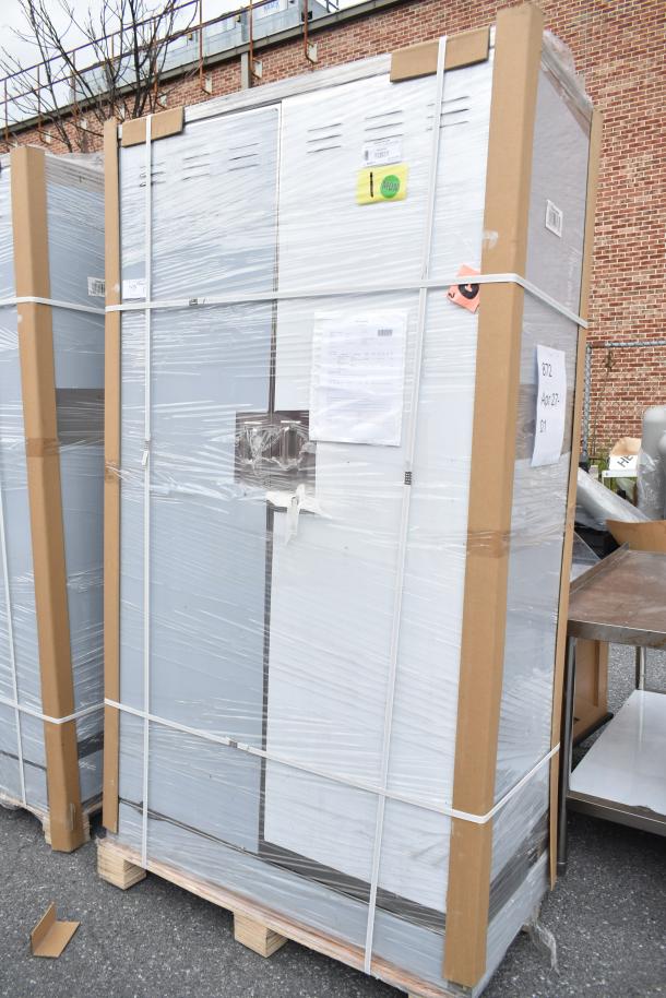 Brand new Regency 600SMC48DDM 48" stainless steel mop sink cabinet, wrapped in packaging, with visible labels and tags.