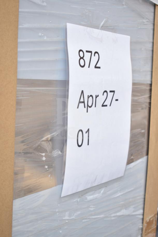 Brand new scratch and dent Regency 600SMC48DDM 48" stainless steel mop sink cabinet, partially packaged.