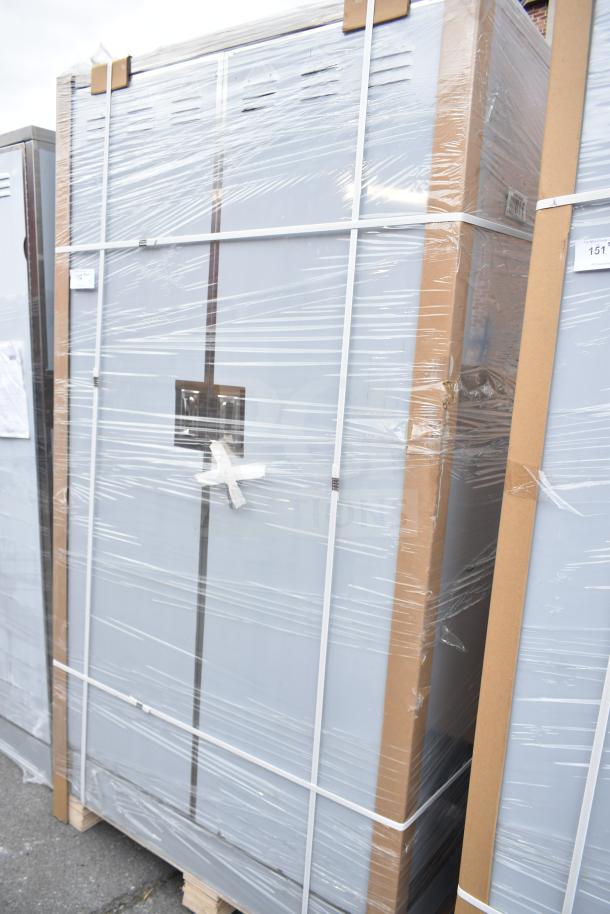 Brand new Regency 600SMC48DDM 48" stainless steel mop sink cabinet, wrapped, minor dents visible.