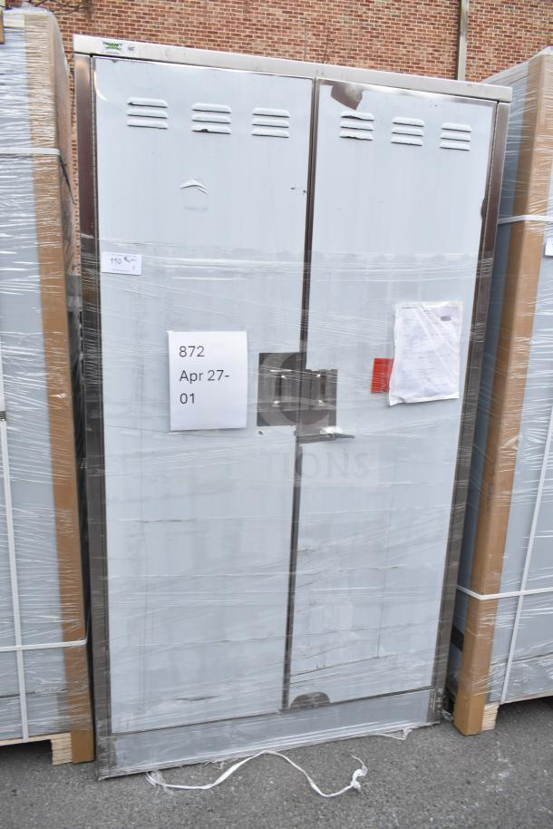 BRAND NEW Scratch and Dent Regency 48" stainless steel mop sink cabinet, model 600SMC48DDM, with visible surface imperfections.