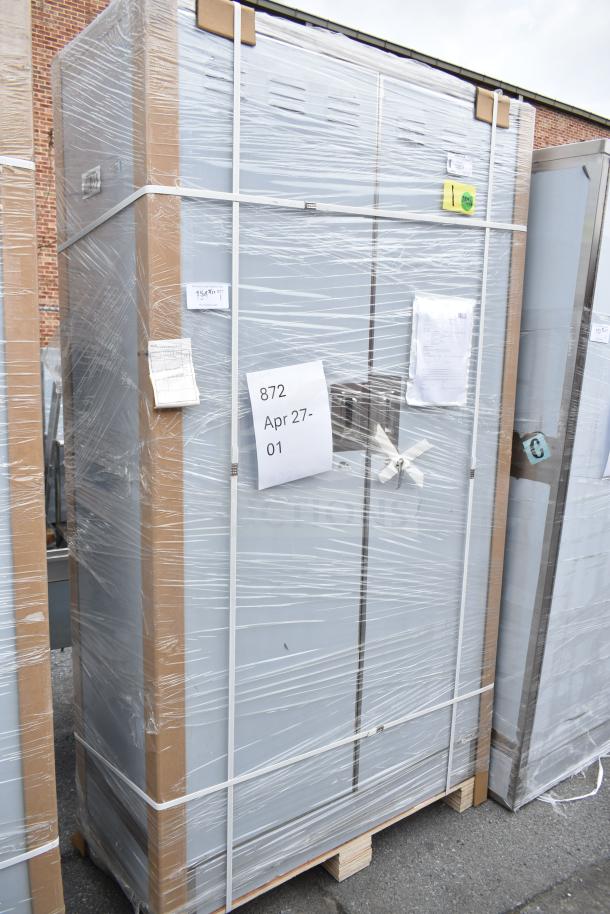 BRAND NEW SCRATCH AND DENT Regency 600SMC48DDM 48" stainless steel mop sink cabinet, wrapped, with visible tags and labels.